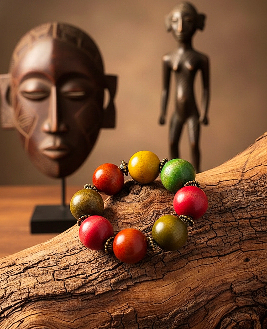 Colorful beaded bracelet on a wooden surface with African art in the background