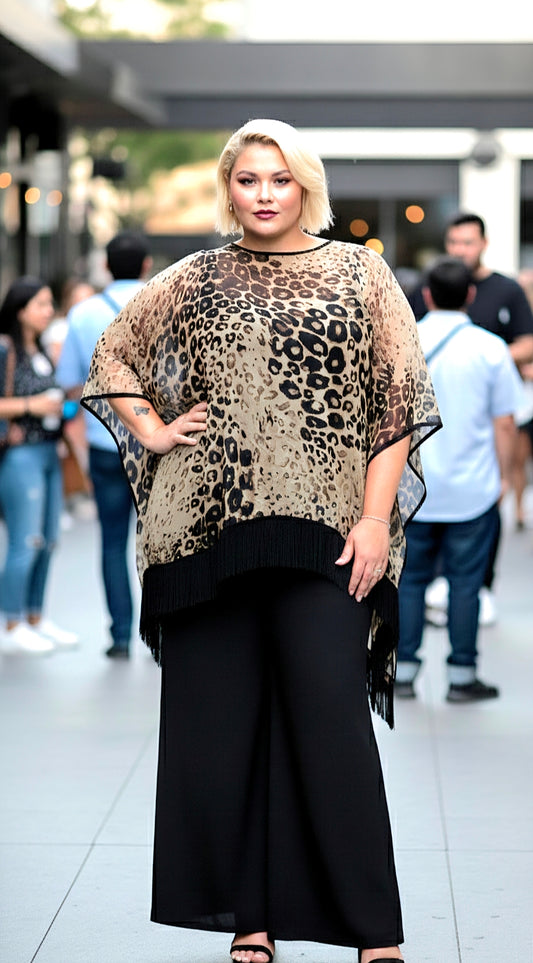 Woman wearing a leopard print top and black skirt in an urban setting
