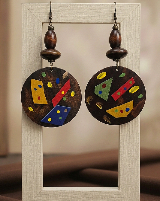 Dark round wood earrings with leather and paint strokes