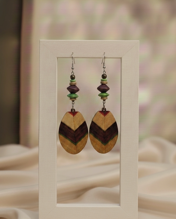 Oval wood earrings with green and burgundy accents